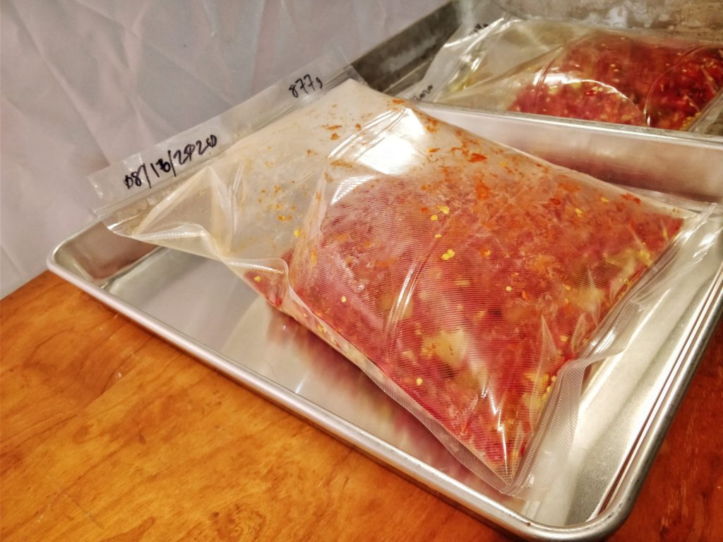 Don't have vacuum sealer. Tried to use straw and lungs to pull vacuum.  Looking alright so far…. : r/fermentation