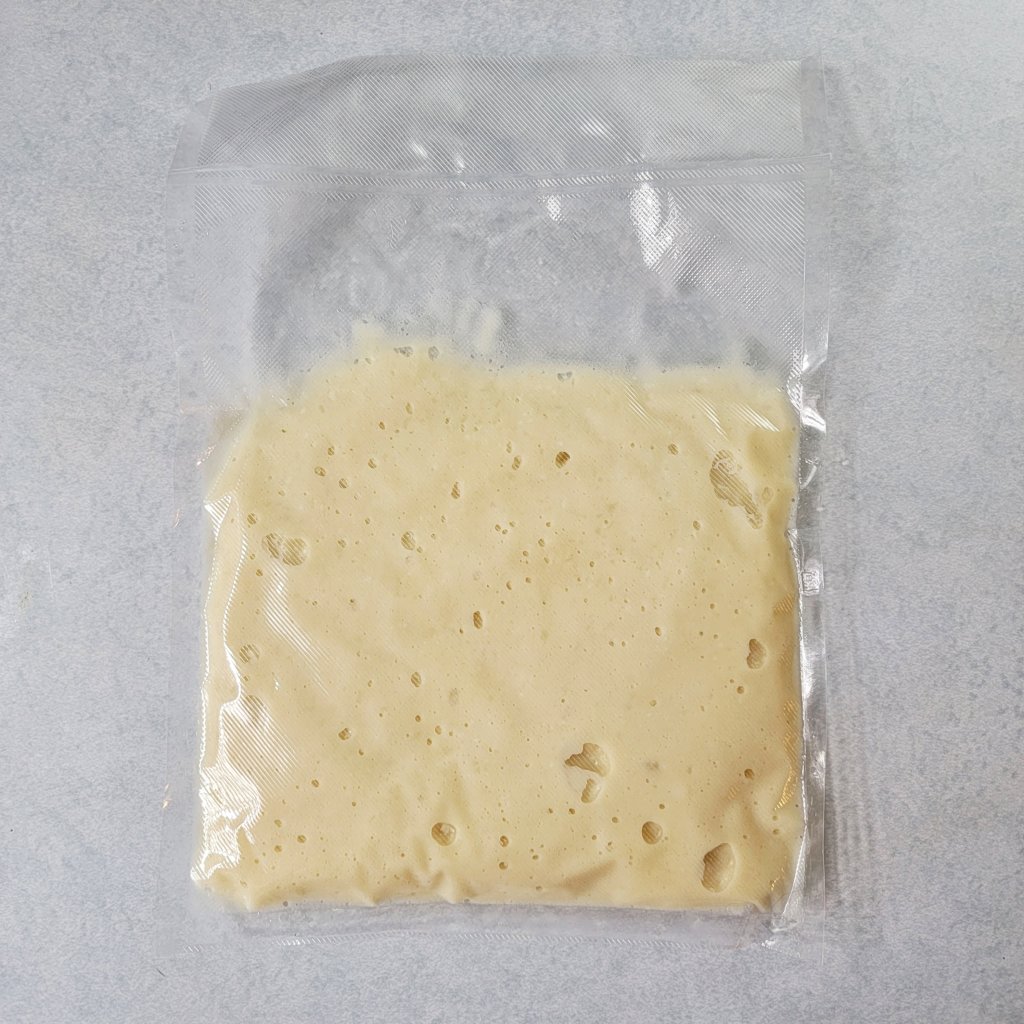 Bag out of the sous vide. The color has darkened, like a light beige.