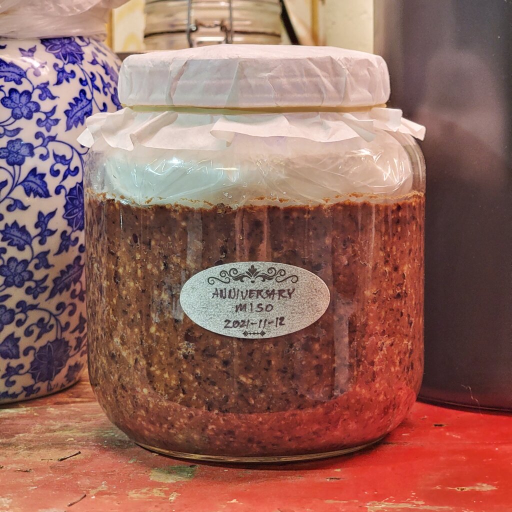 The same jar one year later. The visible grains of rice are a little less vibrant, and other than the other observations mentioned it looks almost the same.